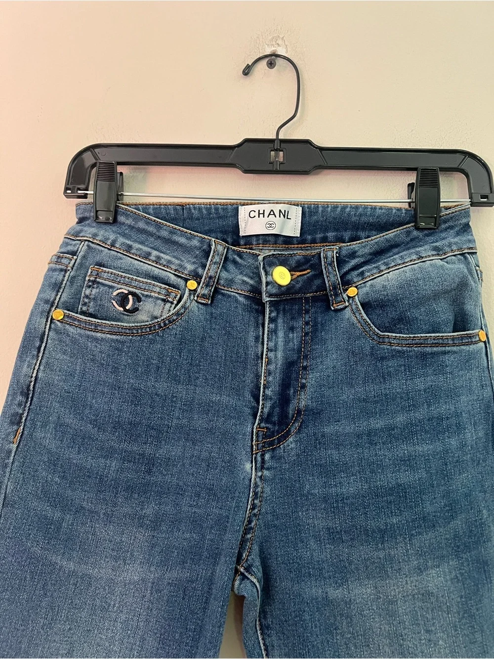 CHANEL Women's Blue Skinny Jeans with Gold-Tone Studs